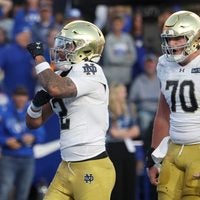 Oct 17, 2026; Provo, Utah, USA; Notre Dame Fighting Irish running back Nolan James Jr. (2) celebrates with offensive line Ashton Craig (70) after scoring a touchdown against the Brigham Young Cougars during the first half at LaVell Edwards Stadium.