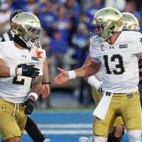 Oct 17, 2026; Provo, Utah, USA; Notre Dame Fighting Irish running back Nolan James Jr. (2) celebrates with quarterback CJ Carr (13) after scoring a touchdown against the Brigham Young Cougars during the first half at LaVell Edwards Stadium.
