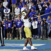 Oct 17, 2026; Provo, Utah, USA; Notre Dame Fighting Irish running back Jonaz Walton (20) celebrates after scoring a two-point conversion against the Brigham Young Cougars during the second half at LaVell Edwards Stadium.