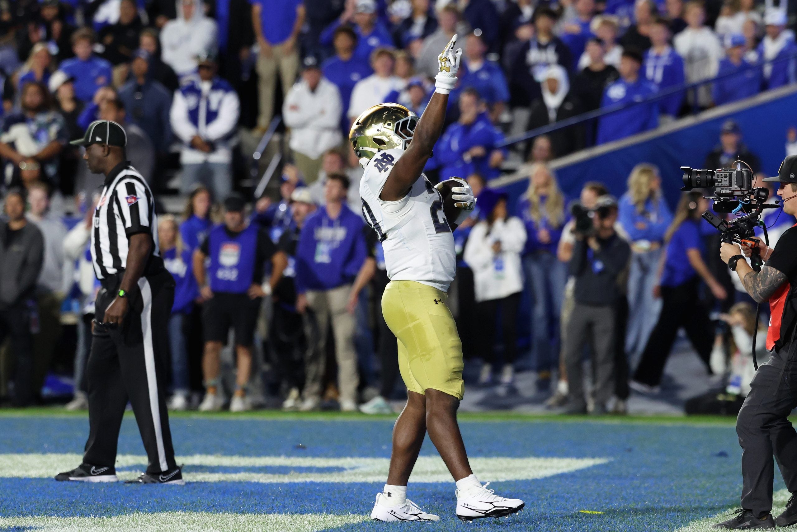 Oct 17, 2026; Provo, Utah, USA; Notre Dame Fighting Irish running back Jonaz Walton (20) celebrates after scoring a two-point conversion against the Brigham Young Cougars during the second half at LaVell Edwards Stadium.