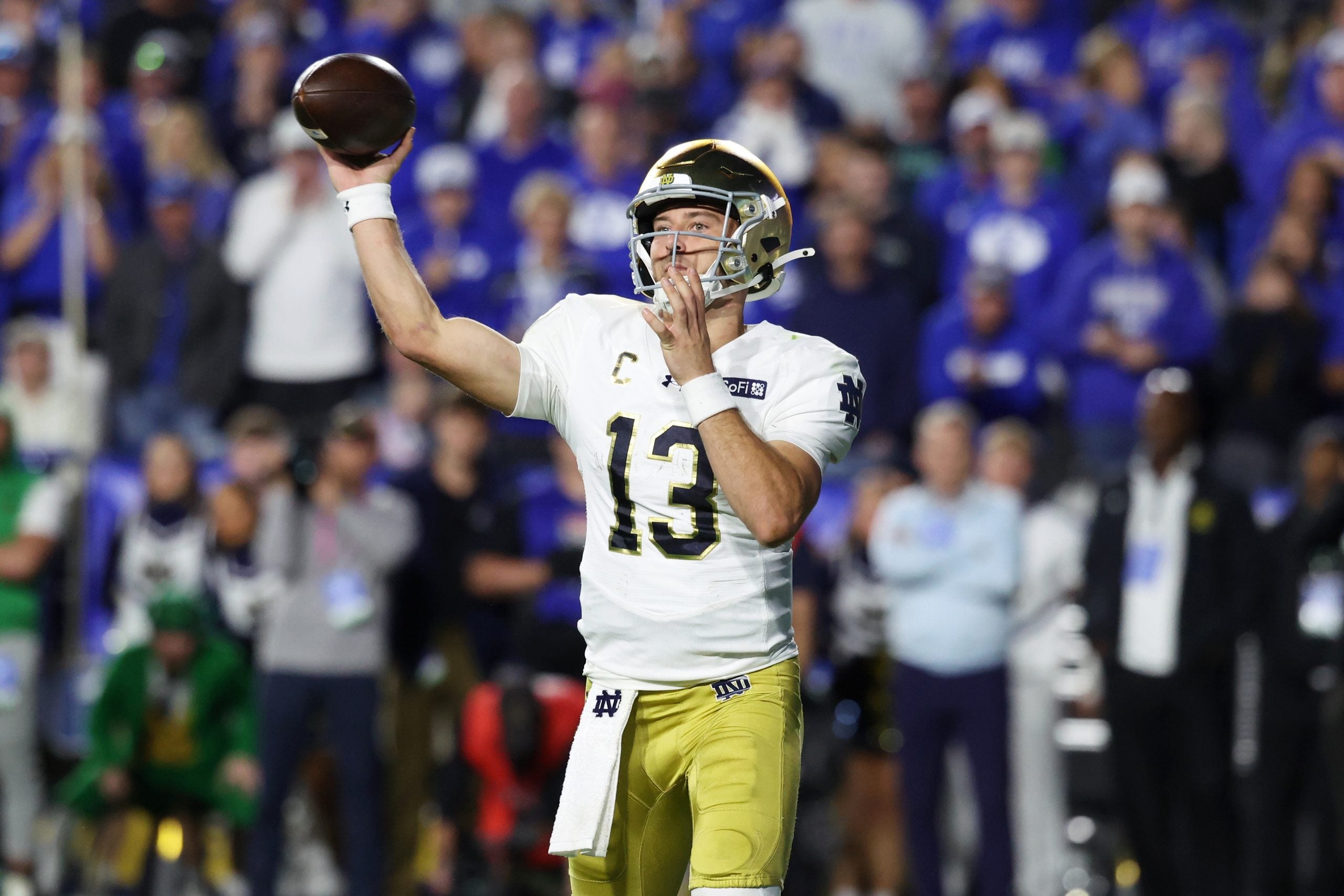 Oct 17, 2026; Provo, Utah, USA; Notre Dame Fighting Irish quarterback CJ Carr (13) passes against the Brigham Young Cougars during the second half at LaVell Edwards Stadium.