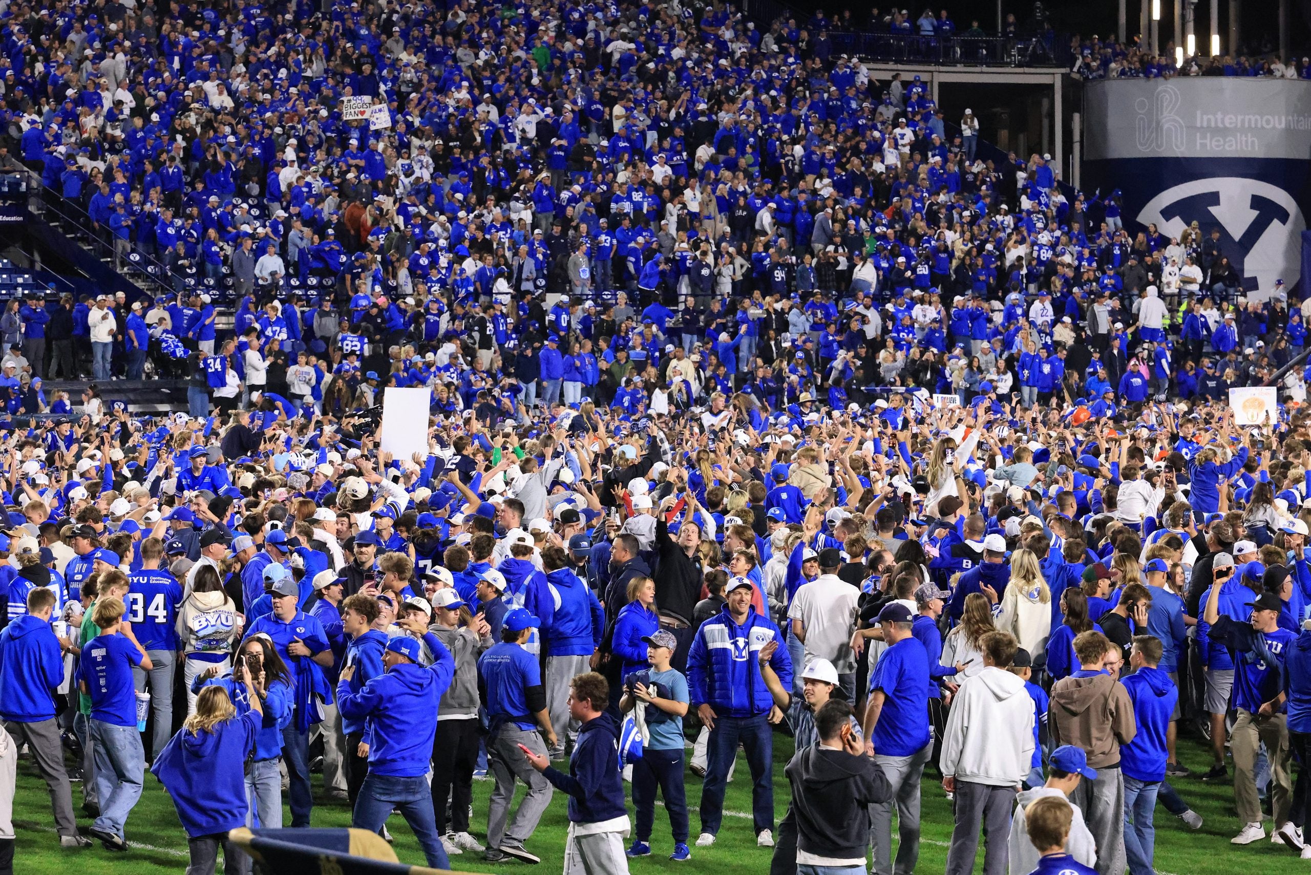 Oct 17, 2026; Provo, Utah, USA; Brigham Young Cougars fans celebrate after the game against the Notre Dame Fighting Irish at LaVell Edwards Stadium.