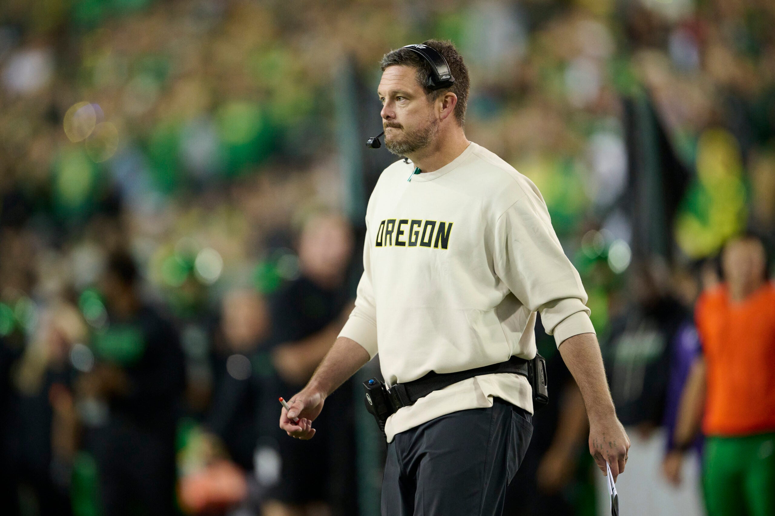 Oct 17, 2026; Eugene, Oregon, USA; Oregon Ducks head coach Dan Lanning walks out to the field after taking a time out late in the second half in a game against the Nebraska Cornhuskers at Autzen Stadium.