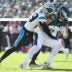 Oct 18, 2026; Philadelphia, Pennsylvania, USA; Philadelphia Eagles tight end Dallas Goedert (88) is tackled by Carolina Panthers cornerback Akayleb Evans (29) during the first half at Lincoln Financial Field.