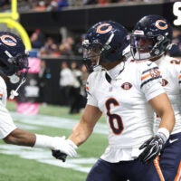 Oct 18, 2026; Atlanta, Georgia, USA; Chicago Bears defensive back Cam Lewis (21) and defensive back Kyler Gordon (6) celebrate during the third quarter against the Atlanta Falcons at Mercedes-Benz Stadium.