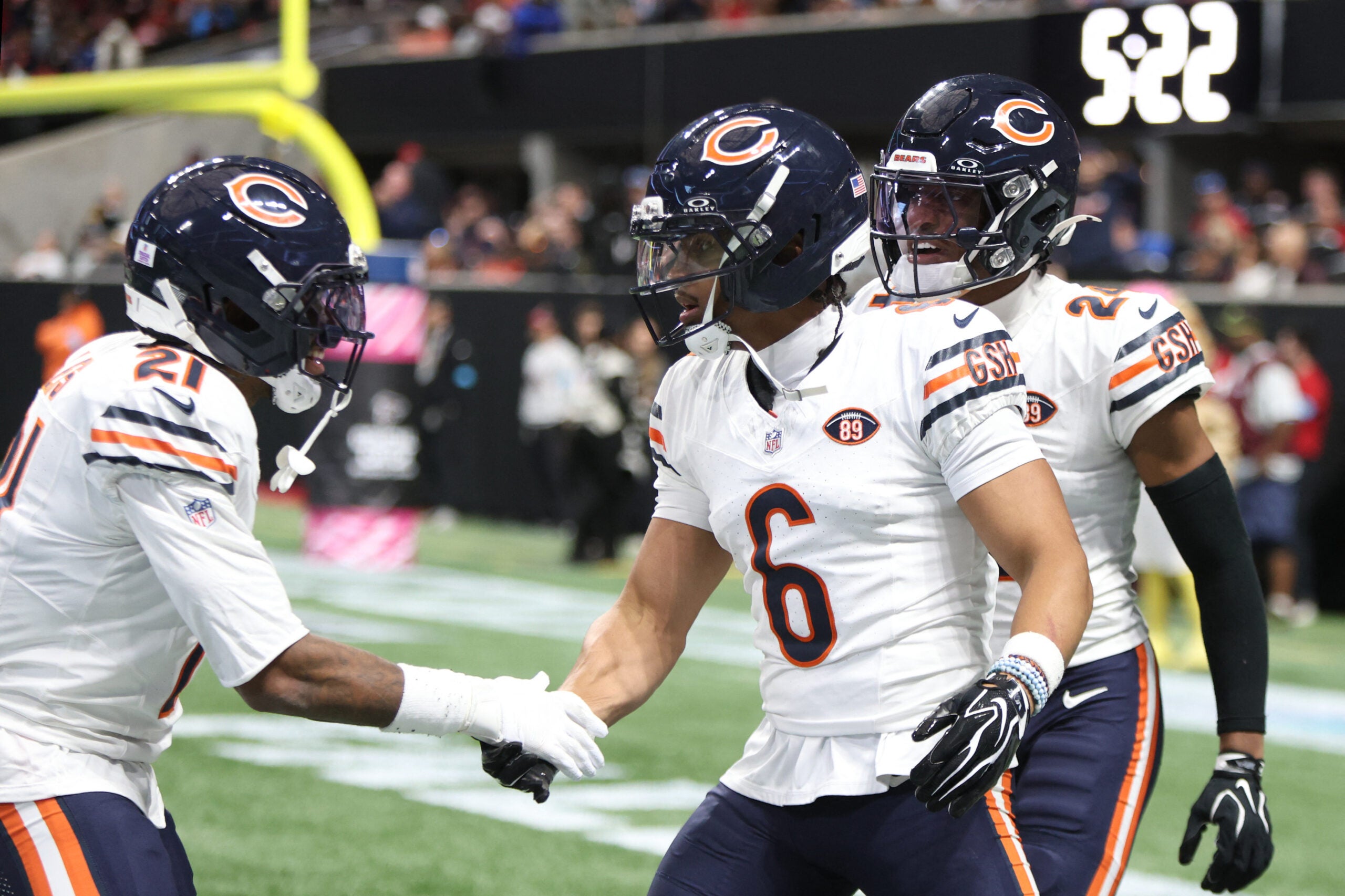 Oct 18, 2026; Atlanta, Georgia, USA; Chicago Bears defensive back Cam Lewis (21) and defensive back Kyler Gordon (6) celebrate during the third quarter against the Atlanta Falcons at Mercedes-Benz Stadium.