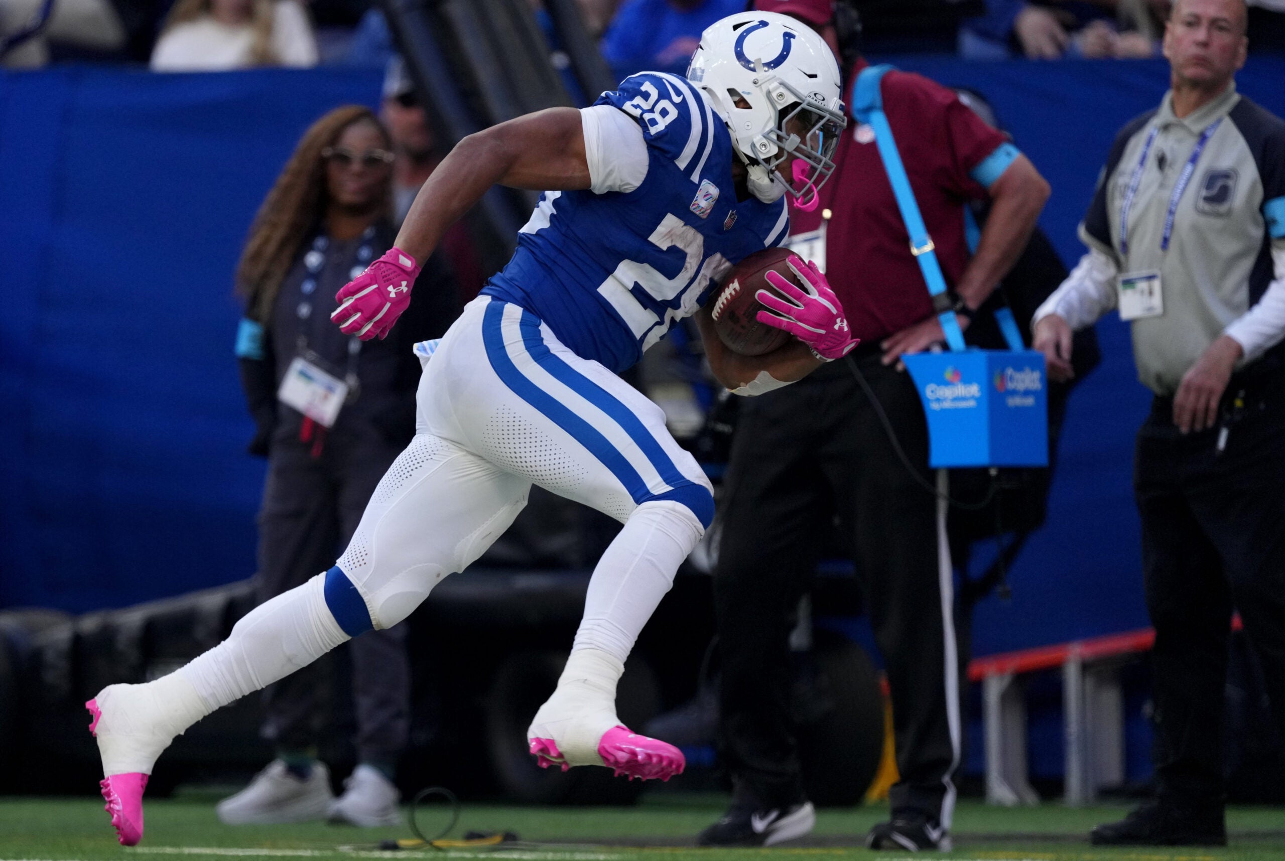 Indianapolis Colts running back Jonathan Taylor (28) rushes down the sideline Sunday, Oct. 18, 2026, during the game against the Tennessee Titans at Lucas Oil Stadium in Indianapolis.