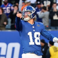 Oct 18, 2026; East Rutherford, New Jersey, USA; New York Giants quarterback J.J. McCarthy (18) reacts after throwing a twenty-four-yard touchdown pass to tight end Isaiah Likely (not pictured) against the New Orleans Saints during the fourth quarter at MetLife Stadium.