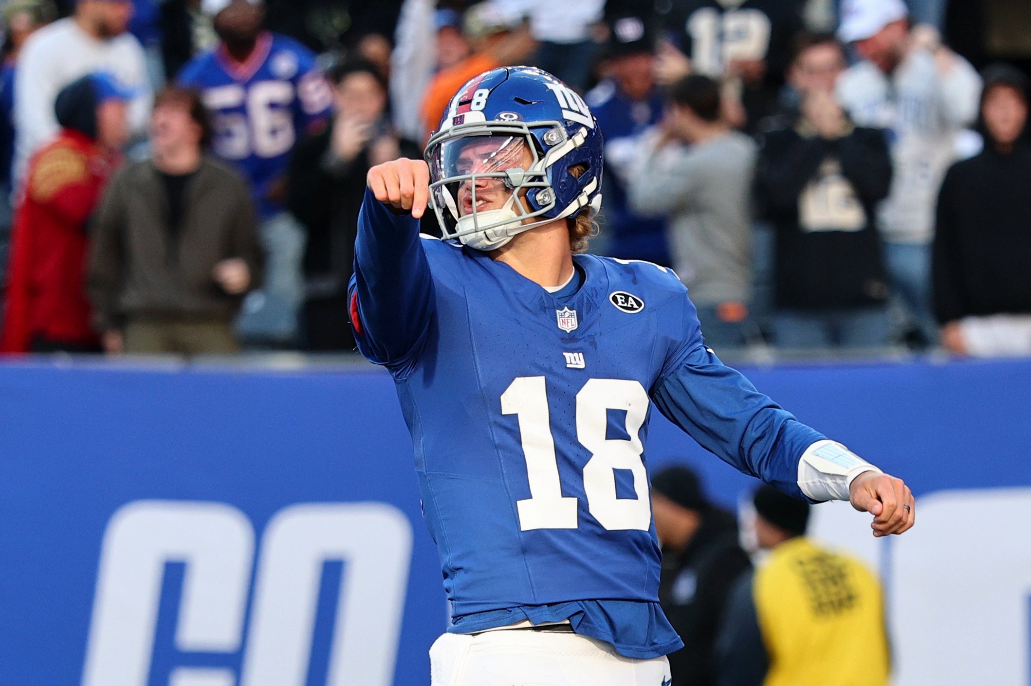 Oct 18, 2026; East Rutherford, New Jersey, USA; New York Giants quarterback J.J. McCarthy (18) reacts after throwing a twenty-four-yard touchdown pass to tight end Isaiah Likely (not pictured) against the New Orleans Saints during the fourth quarter at MetLife Stadium.