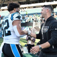 Oct 18, 2026; Philadelphia, Pennsylvania, USA; Carolina Panthers head coach Dave Canales greets tight end Tommy Tremble (82) after win against the Philadelphia Eagles at Lincoln Financial Field.