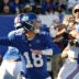 Oct 18, 2026; East Rutherford, New Jersey, USA; New York Giants quarterback J.J. McCarthy (18) throws a pass against New Orleans Saints defensive end Chase Young (99) during the fourth quarter at MetLife Stadium.