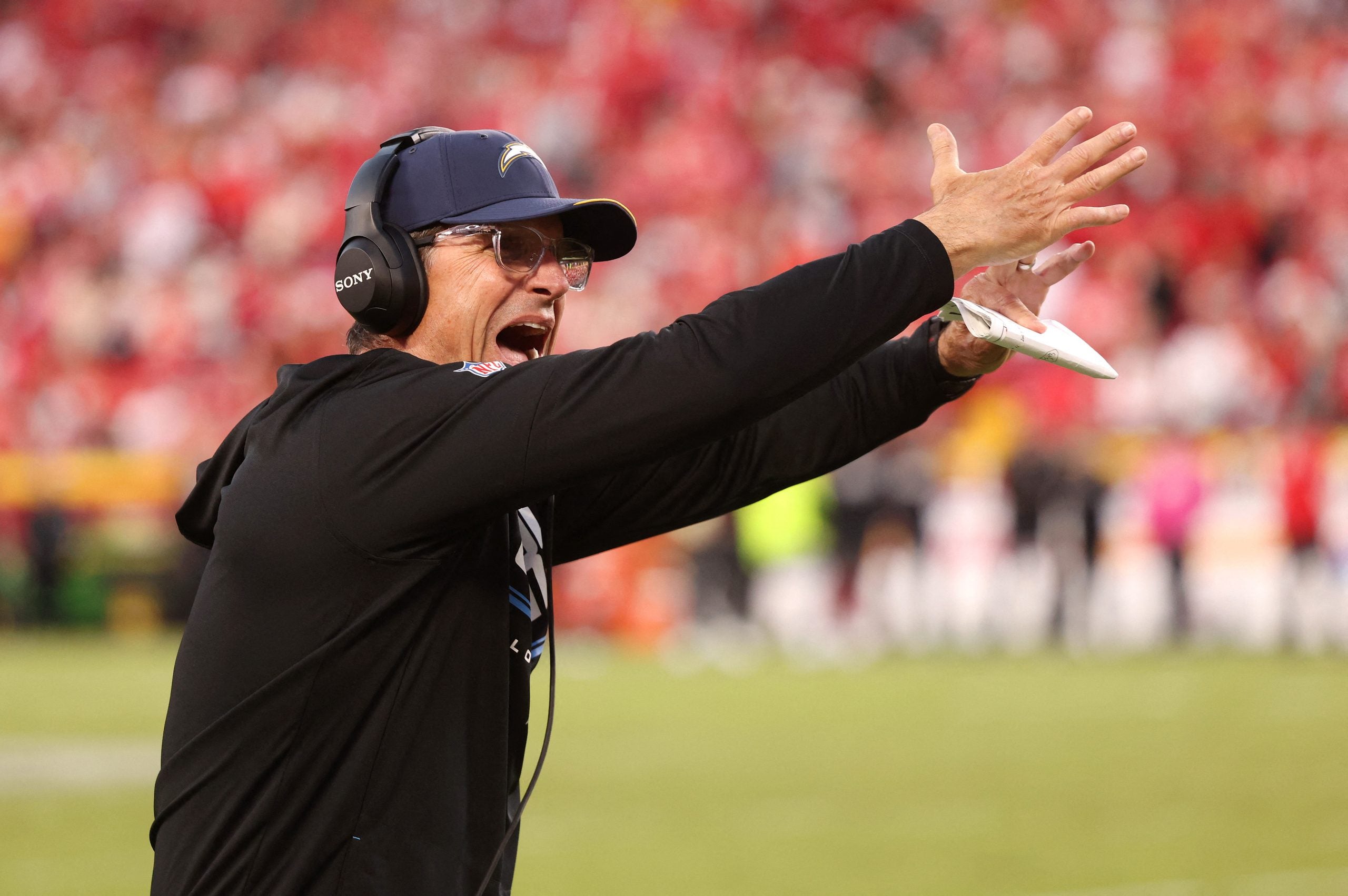 Oct 18, 2026; Kansas City, Missouri, USA; Los Angeles Chargers head coach Jim Harbaugh reacts to a play during the fourth quarter against the Kansas City Chiefs at GEHA Field at Arrowhead Stadium.