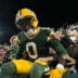 Oct 18, 2026; Green Bay, Wisconsin, USA; Green Bay Packers wide receiver Matthew Golden (0) celebrates with fans after scoring a touchdown against the Dallas Cowboys during the first quarter at Lambeau Field.