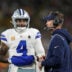 Oct 18, 2026; Green Bay, Wisconsin, USA; Dallas Cowboys quarterback Dak Prescott (4) talks with Dallas Cowboys head coach Brian Schottenheimer talk during the first quarter against the Green Bay Packers at Lambeau Field.
