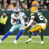 Oct 18, 2026; Green Bay, Wisconsin, USA; Dallas Cowboys wide receiver George Pickens (3) runs the ball against Green Bay Packers cornerback Brandon Cisse (2) during the second half at Lambeau Field.