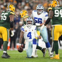 Oct 18, 2026; Green Bay, Wisconsin, USA; Dallas Cowboys quarterback Dak Prescott (4) reacts during the fourth quarter of the game against the Green Bay Packers at Lambeau Field.