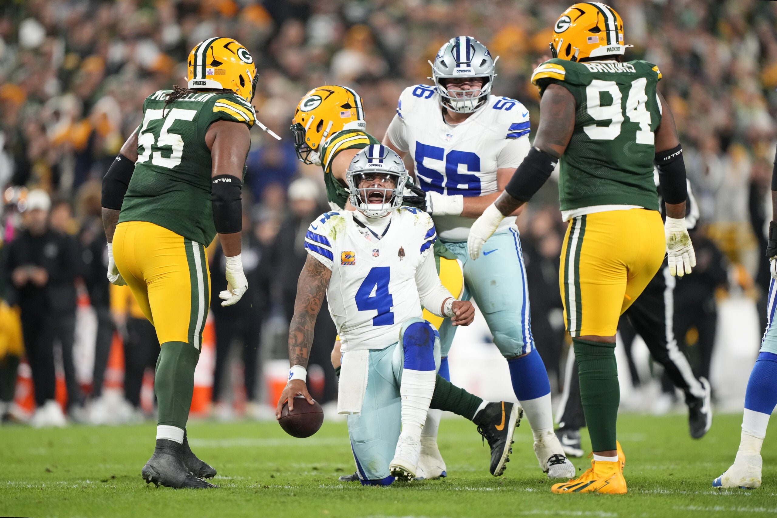 Oct 18, 2026; Green Bay, Wisconsin, USA; Dallas Cowboys quarterback Dak Prescott (4) reacts during the fourth quarter of the game against the Green Bay Packers at Lambeau Field.