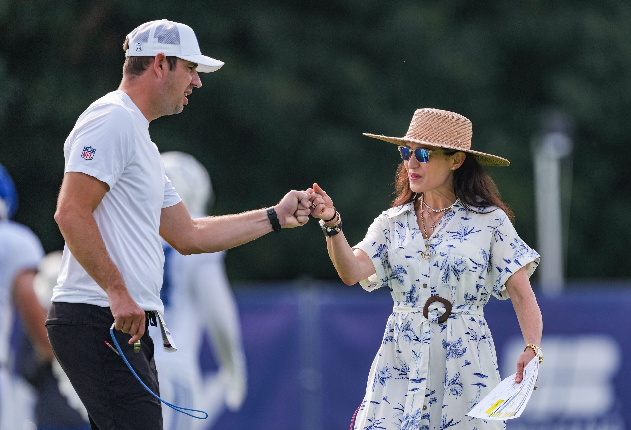 Indianapolis Colts co-owner and CEO Carlie Irsay-Gordon fists bumps Indianapolis Colts head coach Shane Steichen on Monday, Aug. 3, 2026, during practice at Colts Camp at Grand Park in Westfield.