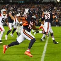 Oct 22, 2026; Chicago, Illinois, USA; Chicago Bears wide receiver Luther Burden III (10) runs for a touchdown against the New England Patriots at Soldier Field.