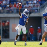 Oct 24, 2026; Dallas, Texas, USA; SMU Mustangs quarterback Kevin Jennings (7) throws a pass against the California Golden Bears during the second half at Gerald J. Ford Stadium.