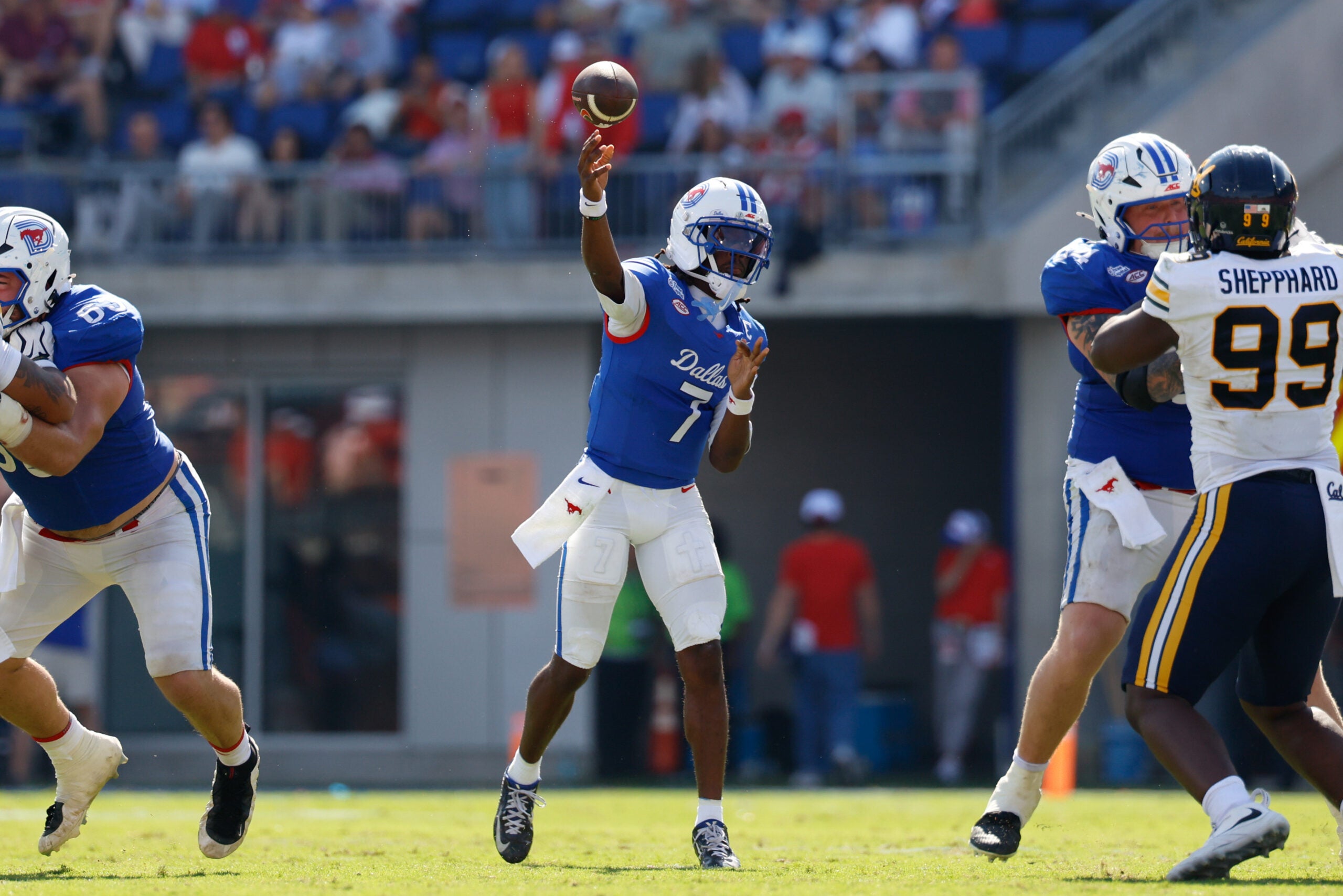 Oct 24, 2026; Dallas, Texas, USA; SMU Mustangs quarterback Kevin Jennings (7) throws a pass against the California Golden Bears during the second half at Gerald J. Ford Stadium.