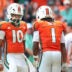 Oct 24, 2026; Miami Gardens, Florida, USA; Miami Hurricanes wide receiver Malachi Toney (1) celebrates with quarterback Darian Mensah (10) after scoring a touchdown against the Pittsburgh Panthers during the second quarter at Hard Rock Stadium.