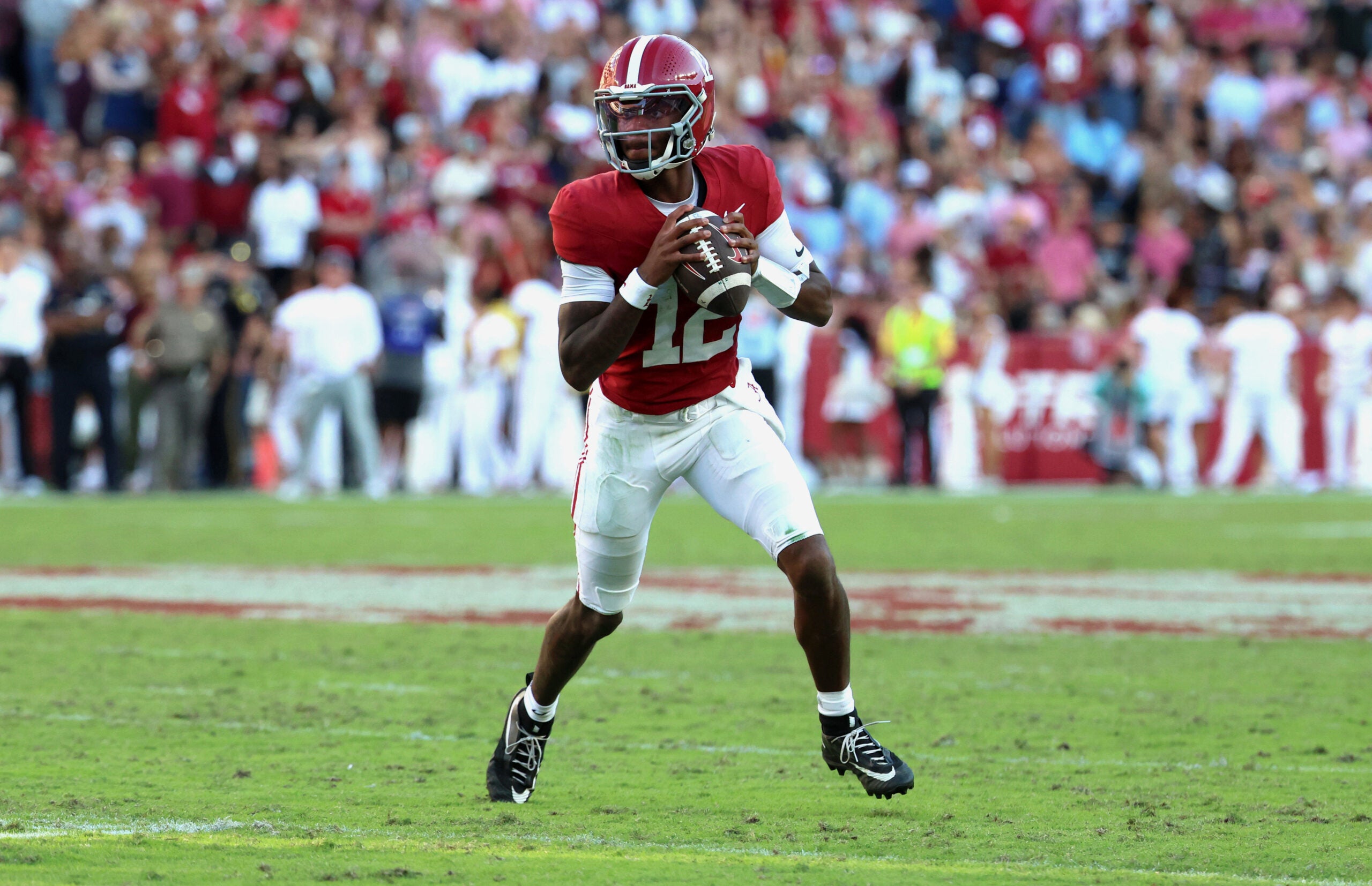 Oct 24, 2026; Tuscaloosa, Alabama, USA; Alabama Crimson Tide quarterback Keelon Russell (12) surveys the field against the Texas A&M Aggies during the second half at Saban Field at Bryant-Denny Stadium.