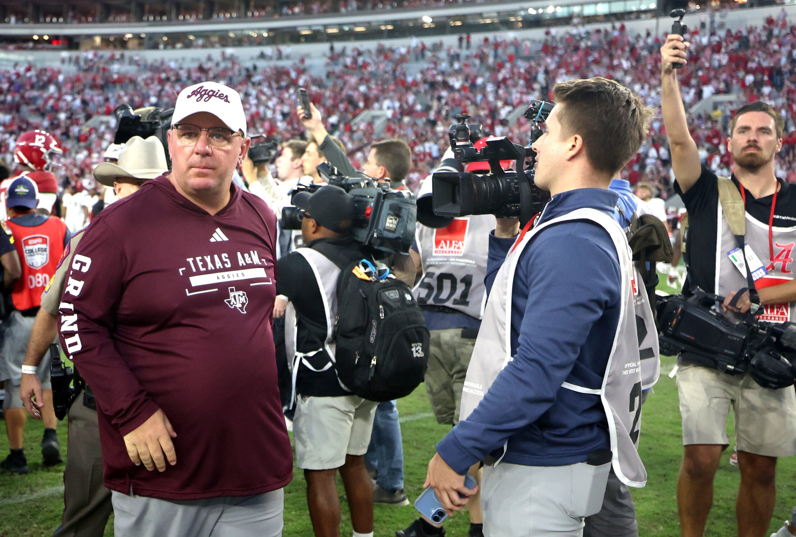 Oct 24, 2026; Tuscaloosa, Alabama, USA; Texas A&M Aggies head coach Mike Elko walks off the field after the game against the Alabama Crimson Tide at Saban Field at Bryant-Denny Stadium.
