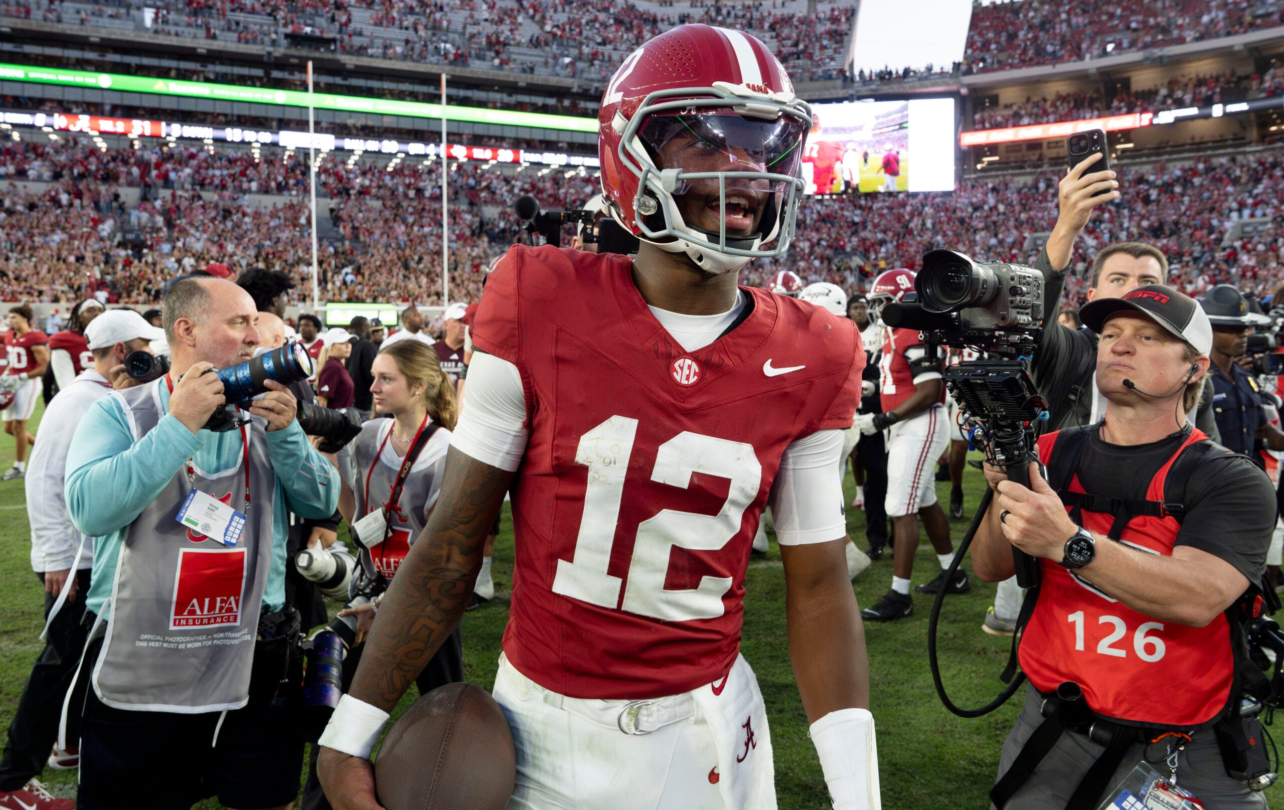 Oct 24, 2026; Tuscaloosa, AL, USA; Alabama quarterback Keelon Russell (12) leaves the field after the Crimson Tide win at Saban Field at Bryant Denny Stadium. Alabama defeated Texas A&M 31-20.