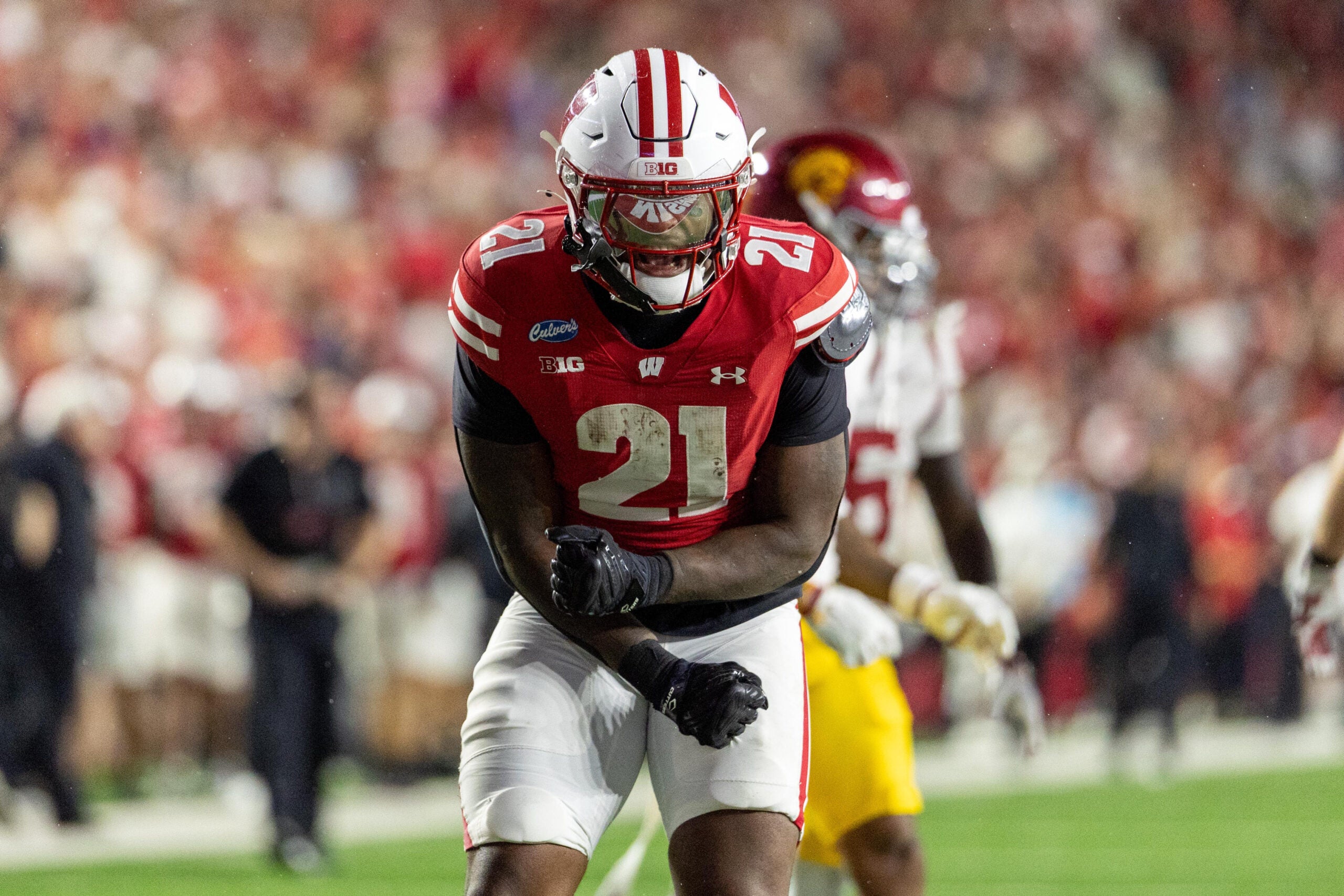 Oct 24, 2026; Madison, Wisconsin, USA; Wisconsin Badgers running back Bryan Jackson II (21) celebrates after a run against the USC Trojans during the second half at Camp Randall Stadium.