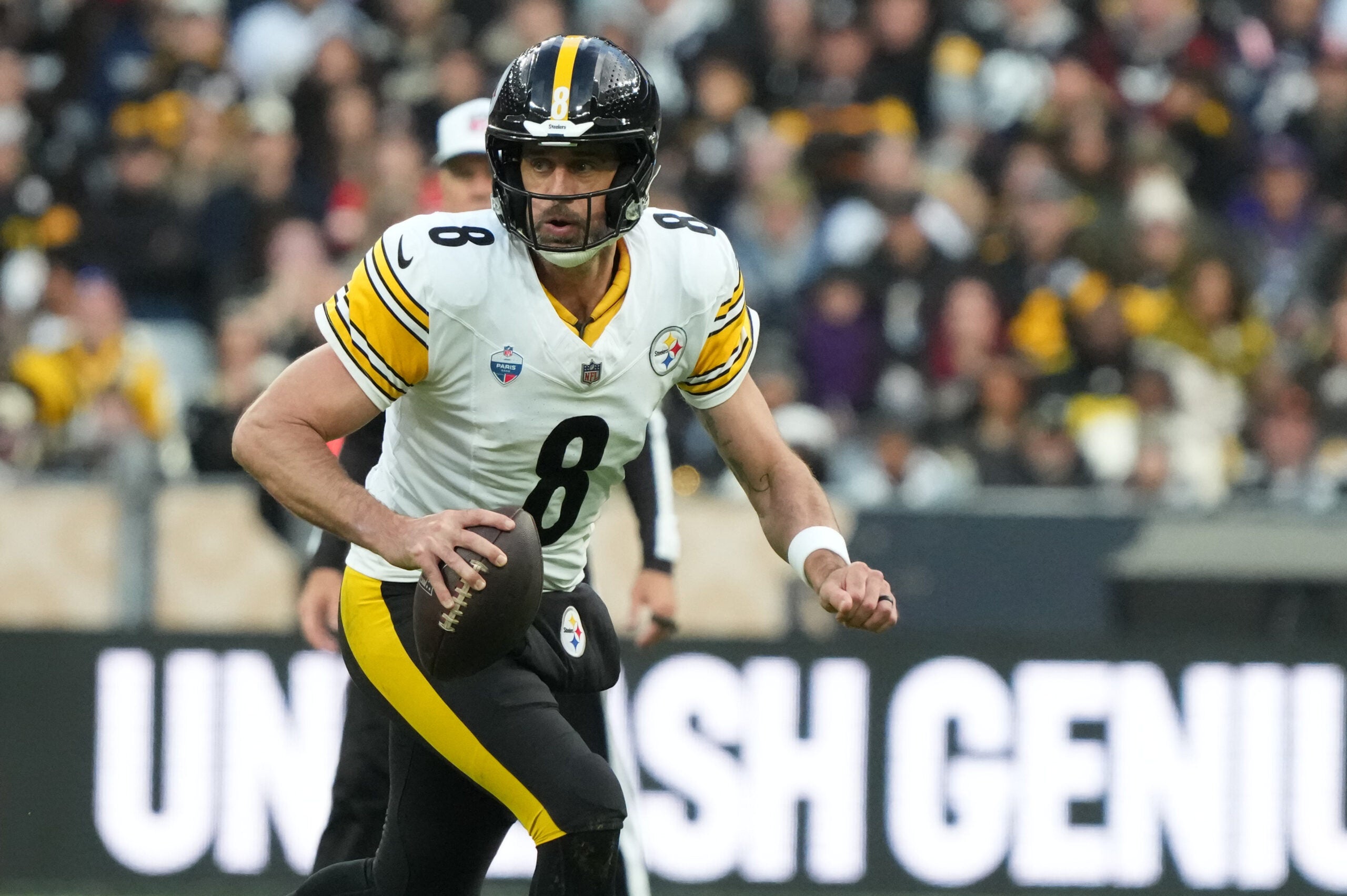 Oct 25, 2026; Paris, FRA; Pittsburgh Steelers quarterback Aaron Rodgers (8) looks to throw downfield New Orleans Saints during the third quarter at Stade de France Stadium.