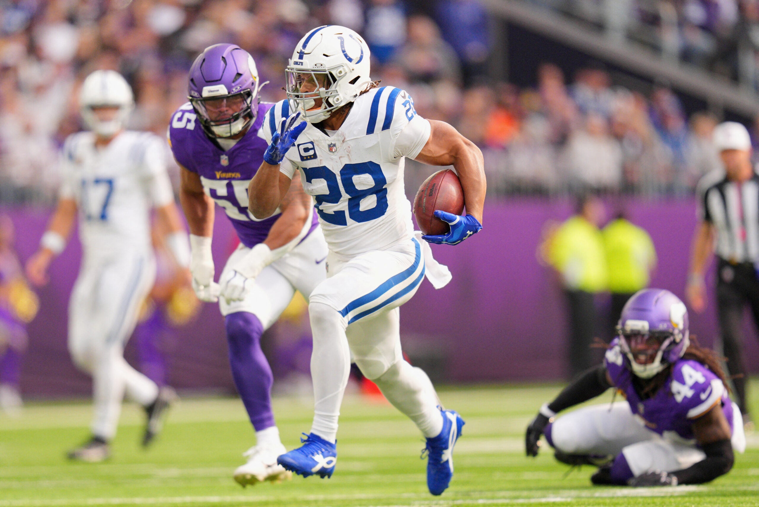 Oct 25, 2026; Minneapolis, Minnesota, USA; Indianapolis Colts running back Jonathan Taylor (28) rushes the ball against the Minnesota Vikings in the first half at U.S. Bank Stadium.