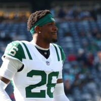 Oct 25, 2026; East Rutherford, New Jersey, USA; New York Jets cornerback Nahshon Wright (26) looks on while warming up before a game against the Miami Dolphins at MetLife Stadium.