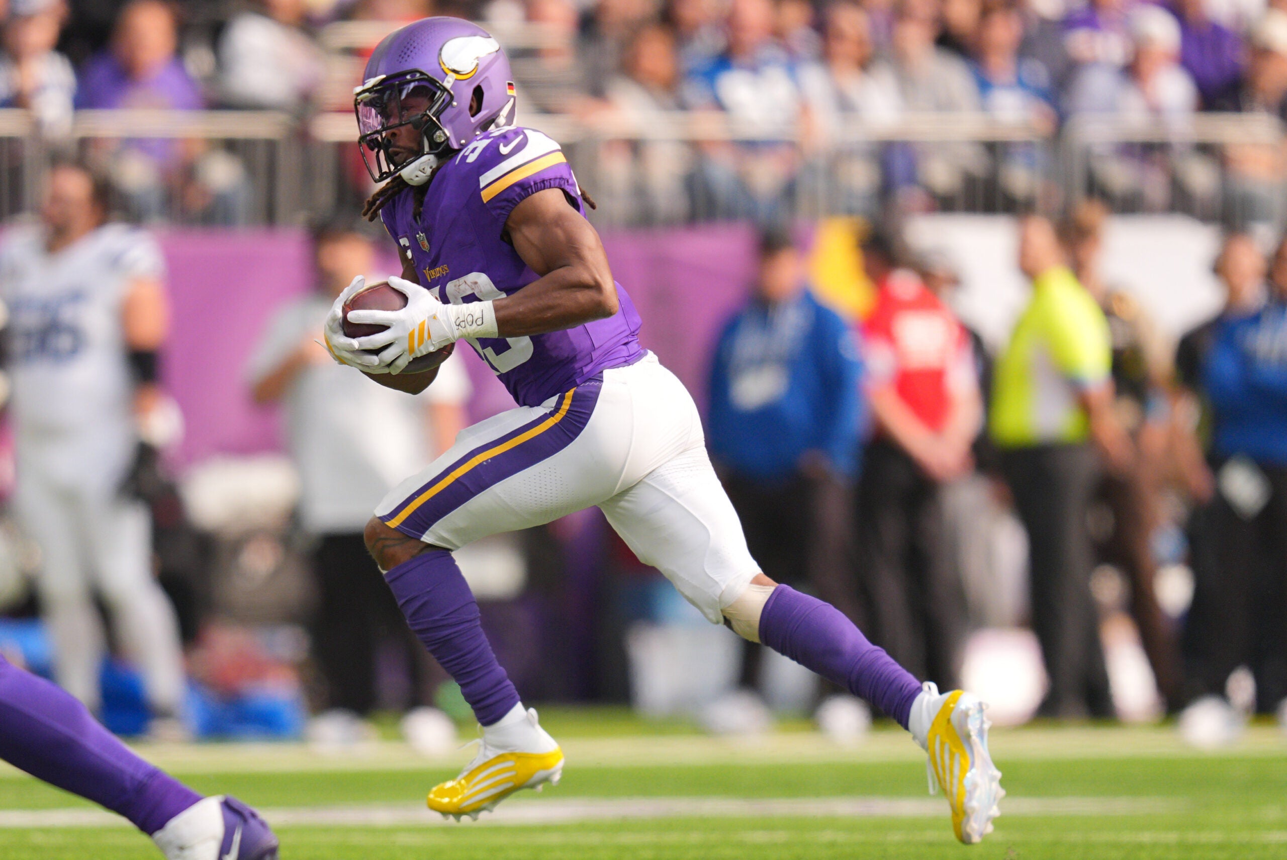 Oct 25, 2026; Minneapolis, Minnesota, USA; Minnesota Vikings running back Aaron Jones Sr. (33) rushes the ball against the Indianapolis Colts in the first half at U.S. Bank Stadium.