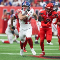 Oct 25, 2026; Houston, Texas, USA; New York Giants running back Cam Skattebo (44) runs with the ball during overtime against the Houston Texans at Reliant Stadium.