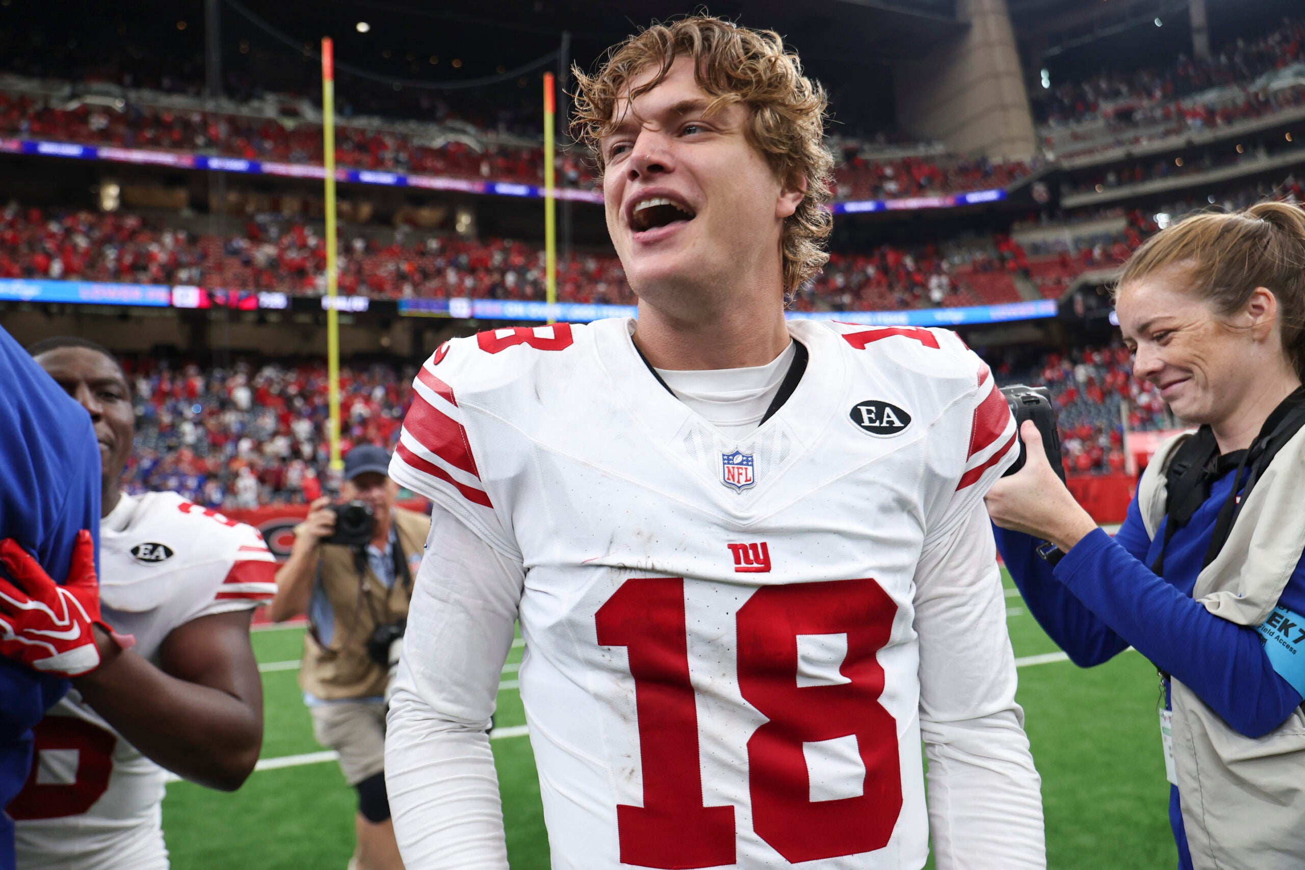 Oct 25, 2026; Houston, Texas, USA; New York Giants quarterback J.J. McCarthy (18) smiles after the game against the Houston Texans at Reliant Stadium.
