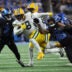Oct 25, 2026; Detroit, Michigan, USA; Green Bay Packers running back Josh Jacobs (8) runs the ball during the fourth quarter against the Detroit Lions at Ford Field.