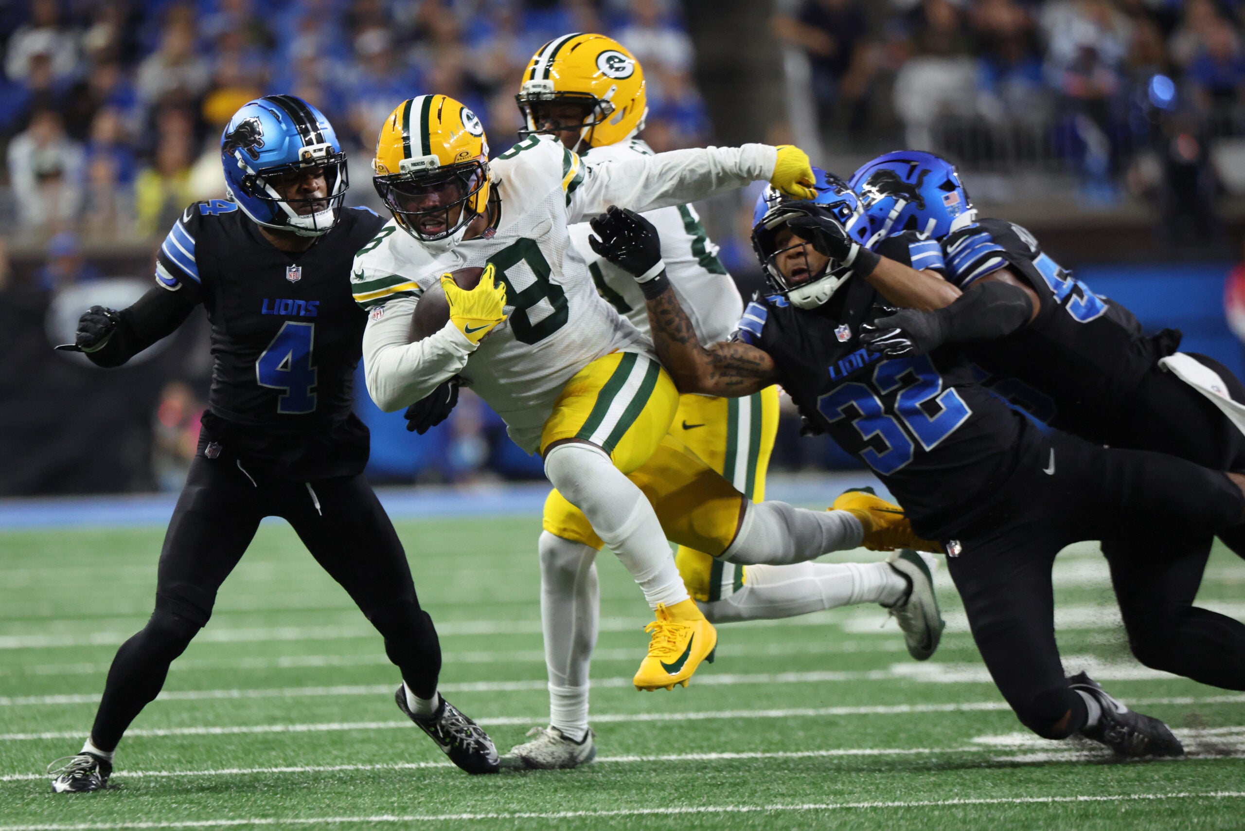 Oct 25, 2026; Detroit, Michigan, USA; Green Bay Packers running back Josh Jacobs (8) runs the ball during the fourth quarter against the Detroit Lions at Ford Field.