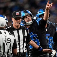 Detroit Lions quarterback Jared Goff (16) talks to a referee regarding a play against Green Bay Packers during the second half at Ford Field in Detroit on Sunday, Oct. 25, 2026.