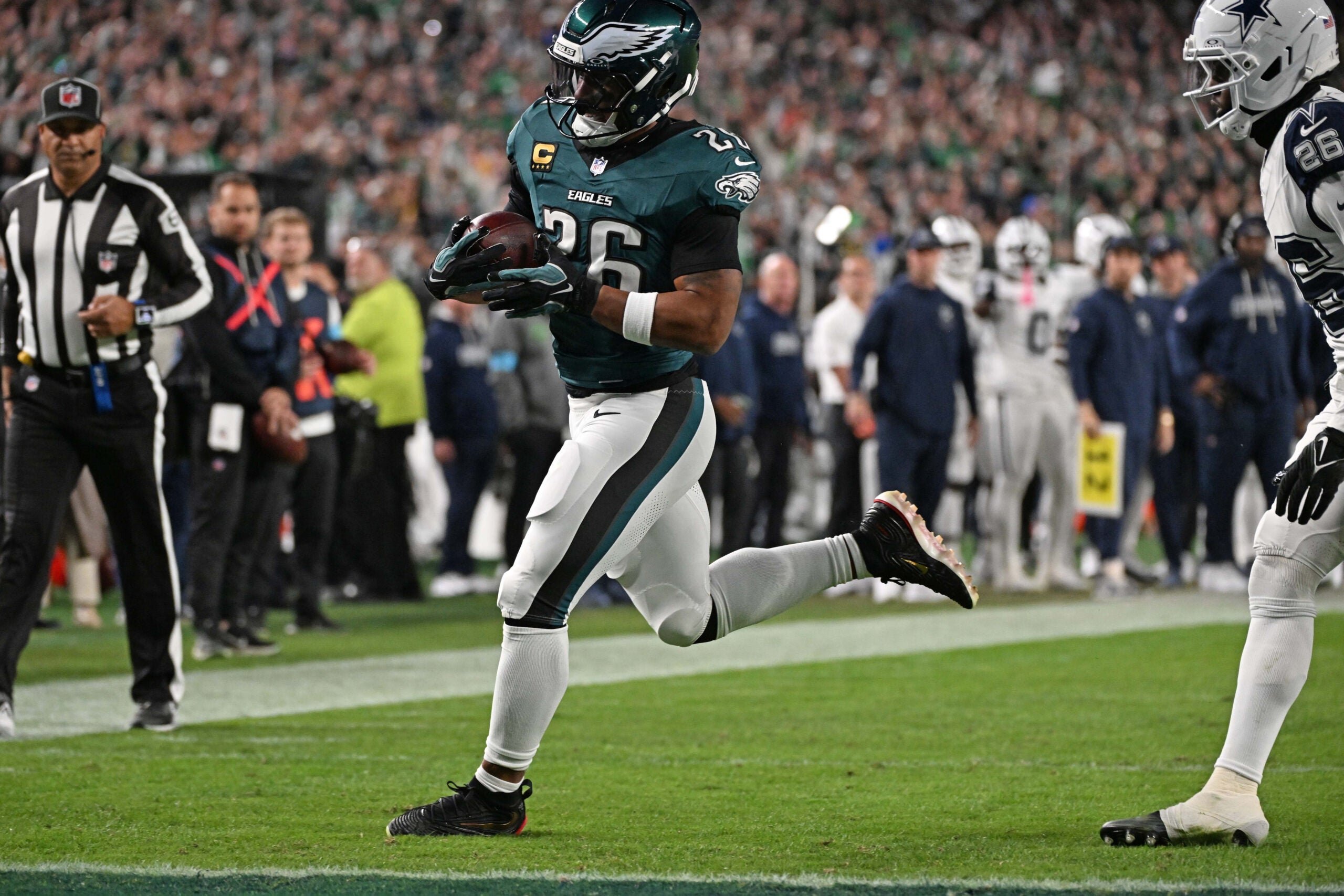 Oct 26, 2026; Philadelphia, Pennsylvania, USA; Philadelphia Eagles running back Saquon Barkley (26) scores a touchdown against the Dallas Cowboys at Lincoln Financial Field.