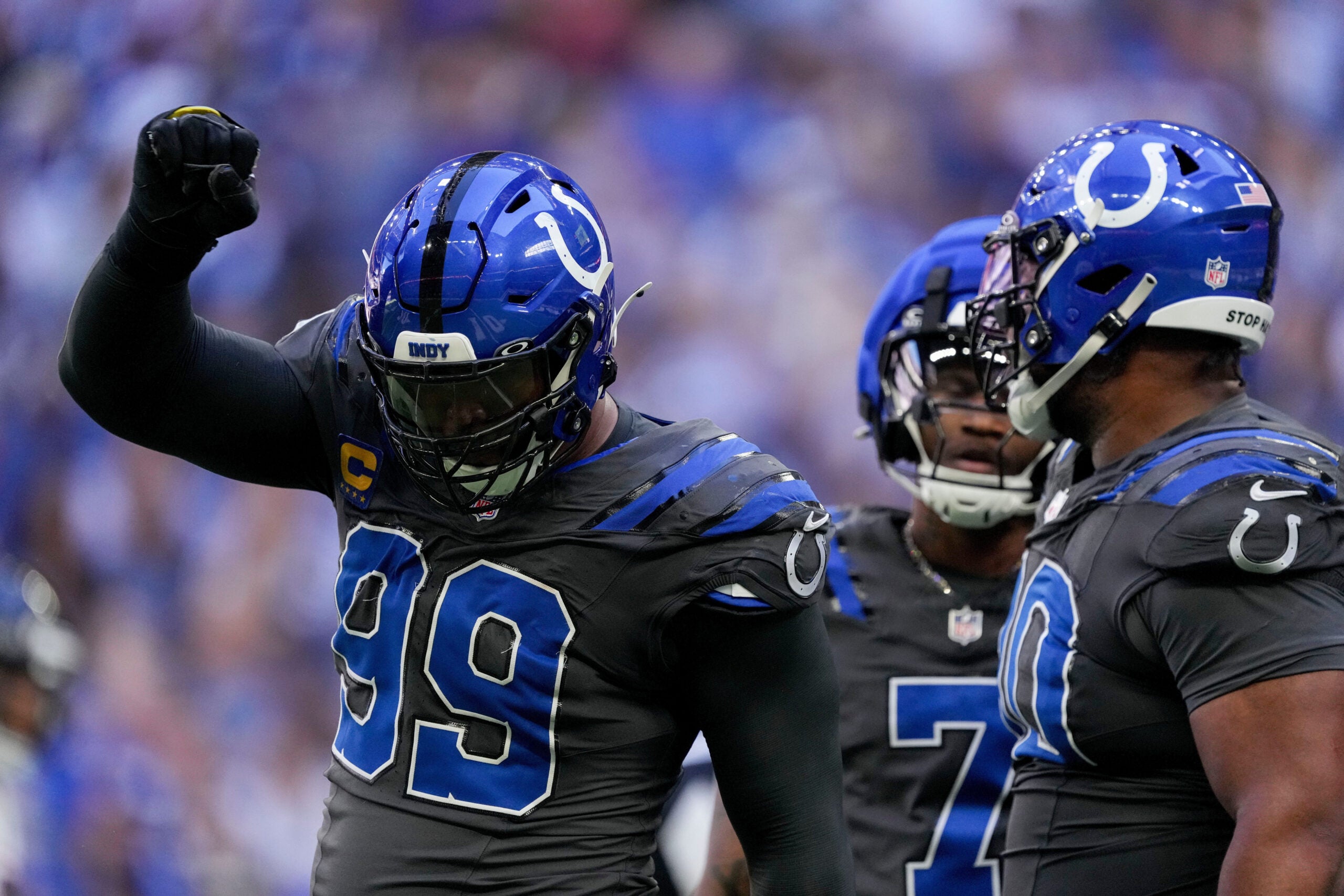 Indianapolis Colts defensive tackle DeForest Buckner (99) celebrates a tackle Sunday, Sept. 27, 2026, during a game against the Houston Texans at Lucas Oil Stadium in Indianapolis.
