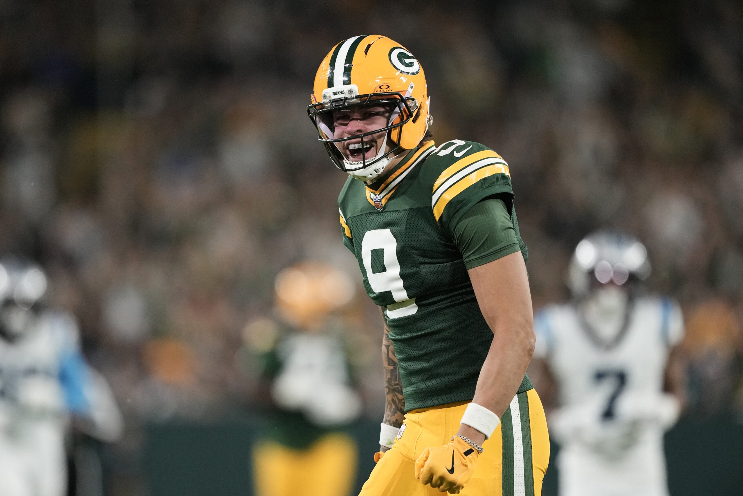 Oct 29, 2026; Green Bay, Wisconsin, USA; Green Bay Packers wide receiver Christian Watson (9) reacts against the Carolina Panthers at Lambeau Field.