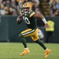 Oct 29, 2026; Green Bay, Wisconsin, USA; Green Bay Packers quarterback Jordan Love (10) drops back to pass against the Carolina Panthers in the second half at Lambeau Field.