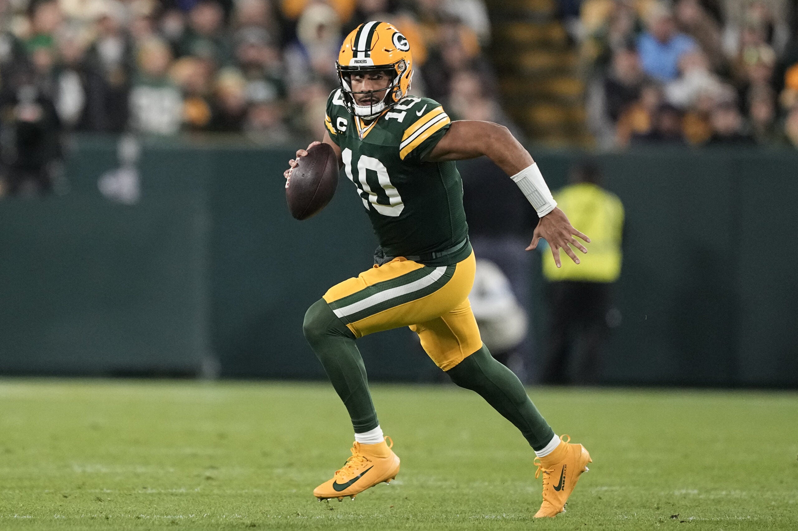 Oct 29, 2026; Green Bay, Wisconsin, USA; Green Bay Packers quarterback Jordan Love (10) drops back to pass against the Carolina Panthers in the second half at Lambeau Field.