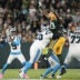 Oct 29, 2026; Green Bay, Wisconsin, USA; Carolina Panthers quarterback Bryce Young (9) drops back to pass against the Green Bay Packers in the second half at Lambeau Field.
