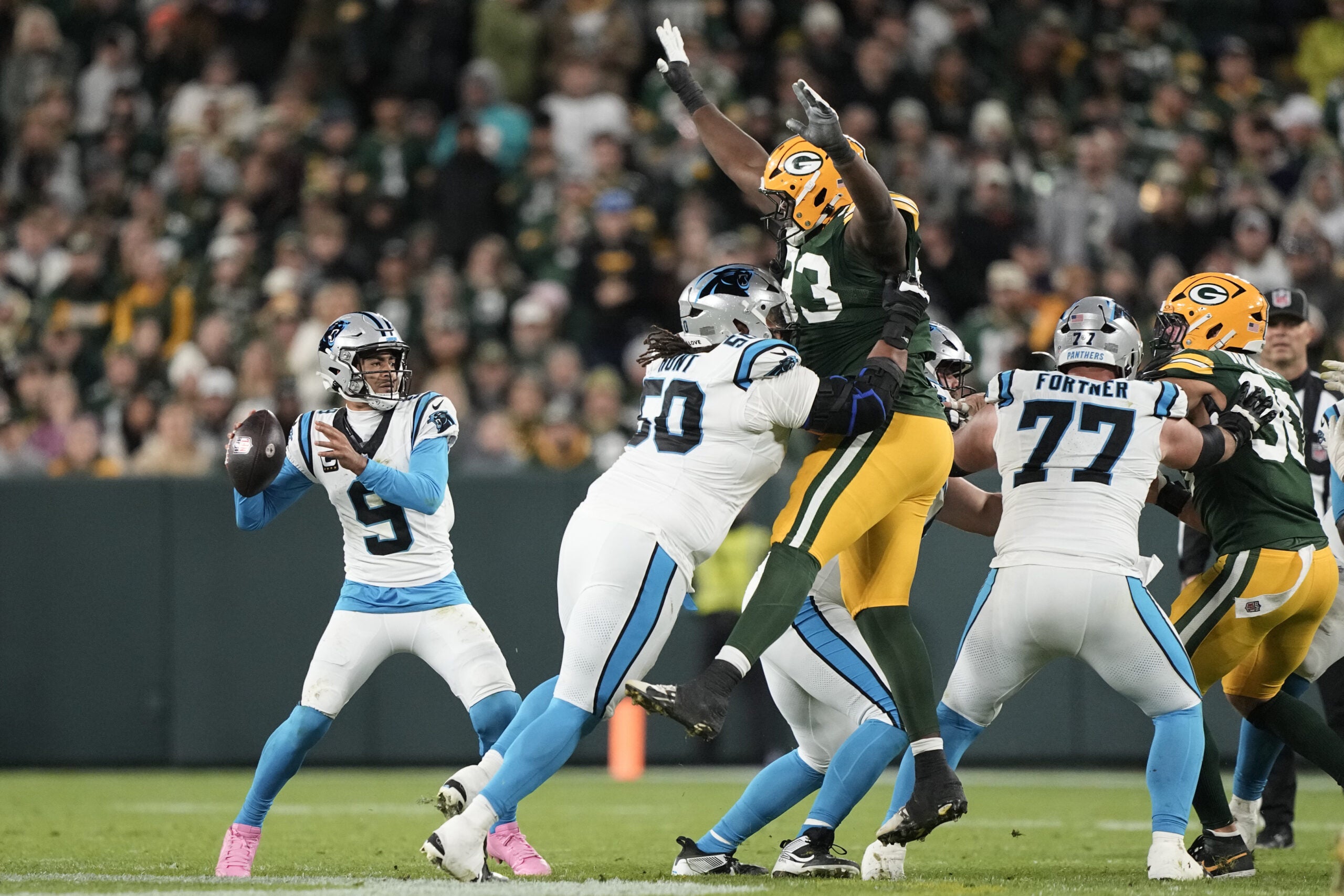 Oct 29, 2026; Green Bay, Wisconsin, USA; Carolina Panthers quarterback Bryce Young (9) drops back to pass against the Green Bay Packers in the second half at Lambeau Field.