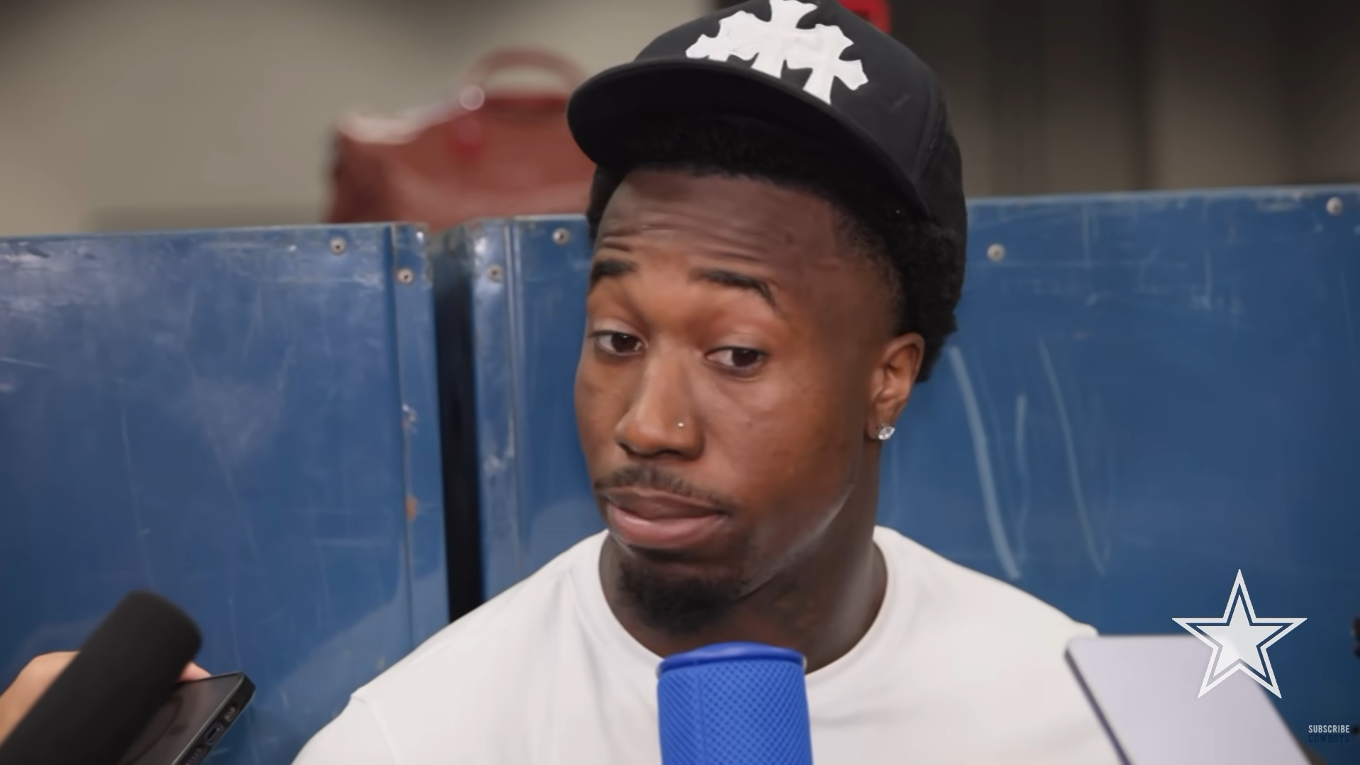 Dallas Cowboys CB Joey Porter Jr. talking to reporters.